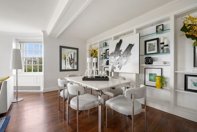 dining space featuring dark hardwood / wood-style floors, beam ceiling, and crown molding