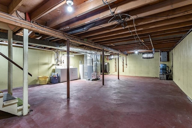 22 Bayview Ave, Berkley, MA 02779 - unfinished below grade area with washer and clothes dryer, electric panel, a water pressure tank, stairway, and oil tank