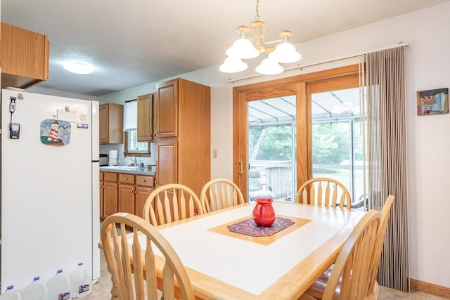 22 Bayview Ave, Berkley, MA 02779 - dining room with a chandelier and baseboards