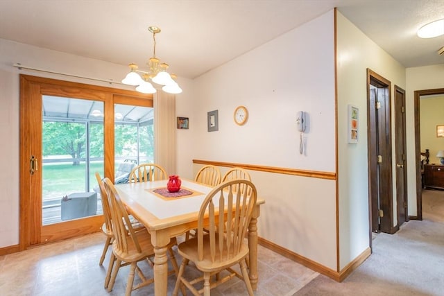 22 Bayview Ave, Berkley, MA 02779 - dining space with a chandelier and baseboards