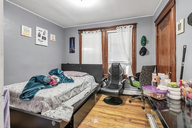 6-8 Maurice Ave, Lawrence, MA 01841 - bedroom with wood-type flooring and crown molding