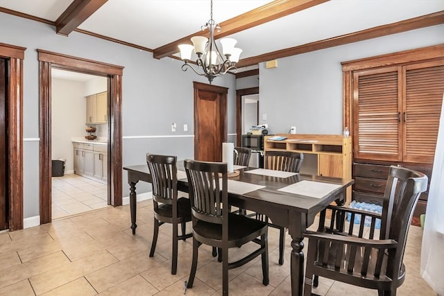 6-8 Maurice Ave, Lawrence, MA 01841 - dining area with a chandelier, beam ceiling, light tile patterned flooring, and ornamental molding