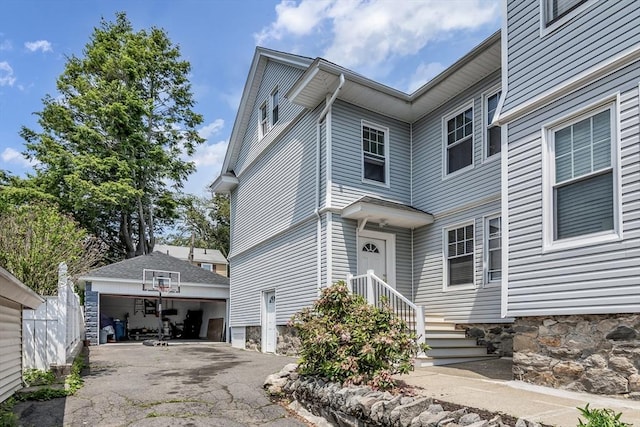 6-8 Maurice Ave, Lawrence, MA 01841 - view of front facade featuring an outbuilding and a garage