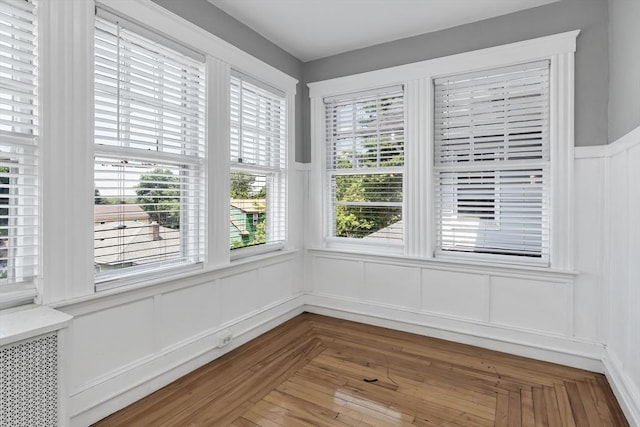 6-8 Maurice Ave, Lawrence, MA 01841 - interior space featuring a decorative wall, healthy amount of natural light, and a wainscoted wall