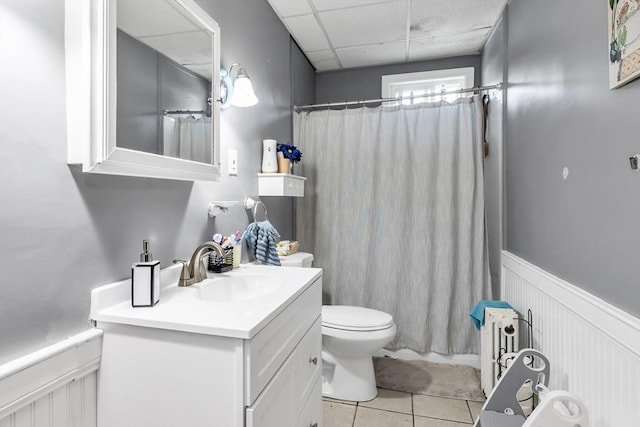 6-8 Maurice Ave, Lawrence, MA 01841 - bathroom with vanity, tile patterned floors, wainscoting, a drop ceiling, and radiator