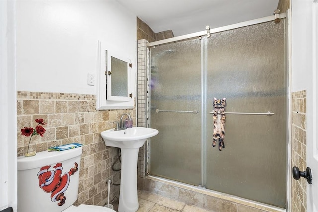 6-8 Maurice Ave, Lawrence, MA 01841 - full bathroom featuring a shower stall, tile walls, and wainscoting
