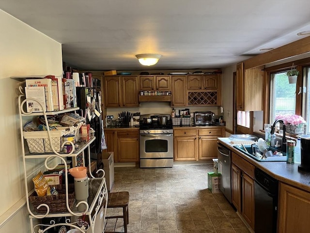 kitchen featuring under cabinet range hood, brown cabinets, appliances with stainless steel finishes, and a sink