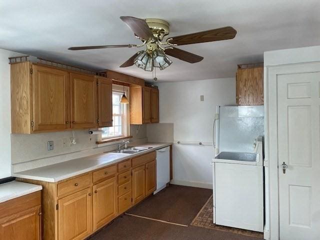 141 Hobart St, Braintree, MA 02184 - kitchen featuring white appliances, a sink, ceiling fan, light countertops, and baseboards