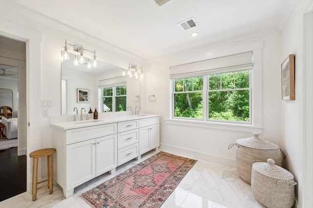 40 Carver Rd, Wellesley, MA 02481 - bathroom featuring double vanity, marble finish flooring, ensuite bath, and recessed lighting