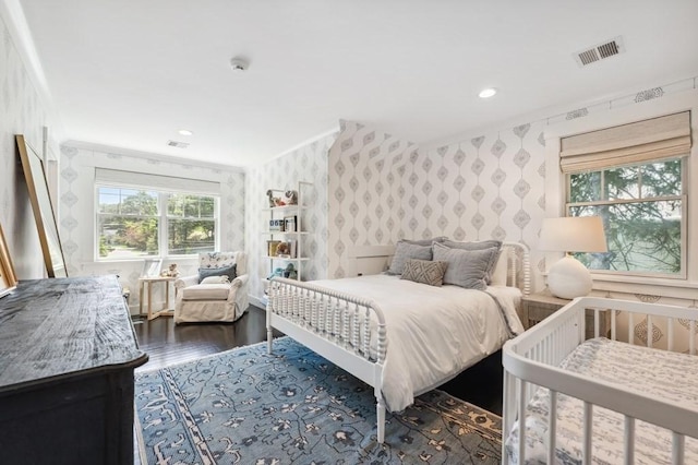 40 Carver Rd, Wellesley, MA 02481 - bedroom with wallpapered walls, wood finished floors, recessed lighting, and ornamental molding