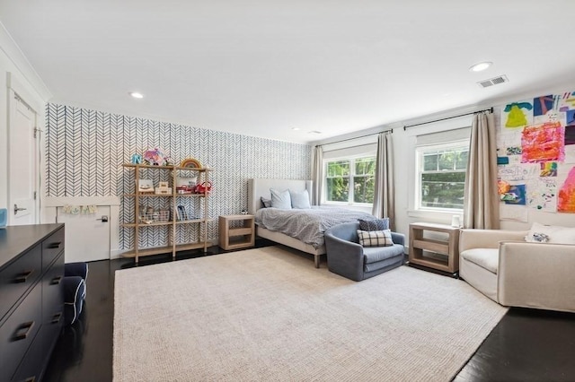 40 Carver Rd, Wellesley, MA 02481 - bedroom with wallpapered walls, an accent wall, wood finished floors, and recessed lighting