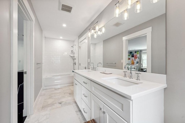40 Carver Rd, Wellesley, MA 02481 - ensuite bathroom with marble finish floors, double vanity, and recessed lighting