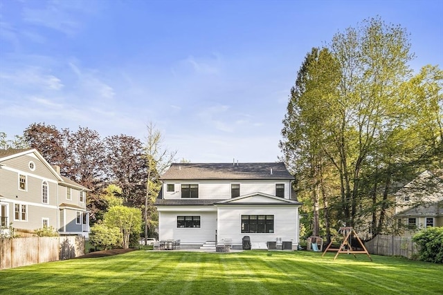 40 Carver Rd, Wellesley, MA 02481 - rear view of property with a playground