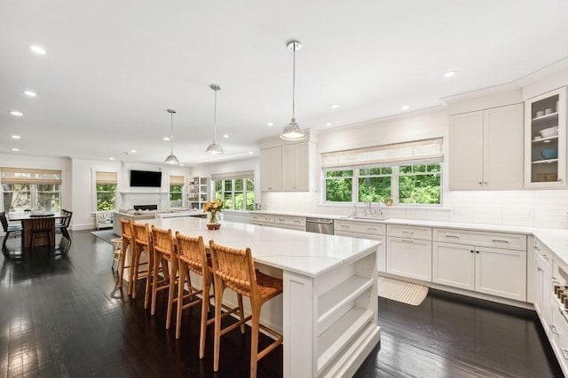 40 Carver Rd, Wellesley, MA 02481 - kitchen featuring dishwasher, healthy amount of natural light, recessed lighting, and white cabinets