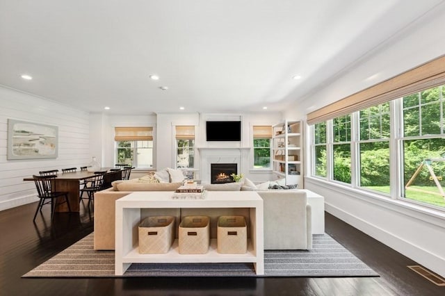 40 Carver Rd, Wellesley, MA 02481 - living room featuring a lit fireplace, dark wood finished floors, and recessed lighting