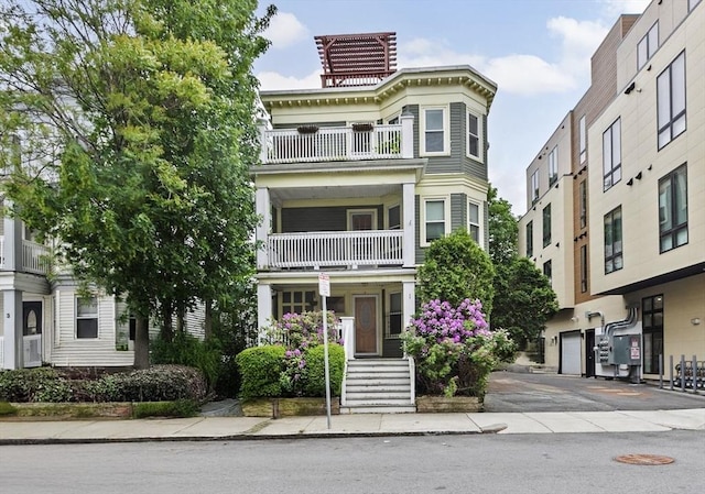 1 King St Unit 3, Boston, MA 02122 - view of front of home featuring a balcony, driveway, and an attached garage