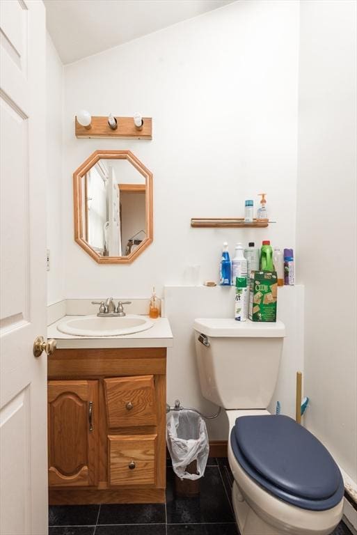 98 Safford St, Quincy, MA 02171 - bathroom with vanity, tile patterned floors, and lofted ceiling