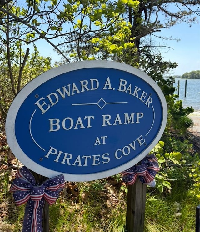 62 Musket, Mashpee, MA 02649 - community / neighborhood sign featuring a water view