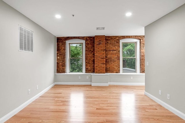 72 River St Unit 5, Haverhill, MA 01832 - spare room featuring healthy amount of natural light, light wood-style floors, recessed lighting, and baseboards