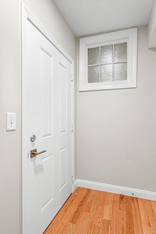 72 River St Unit 5, Haverhill, MA 01832 - entryway with light wood finished floors and baseboards
