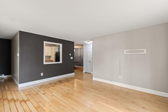 733 W Main Unit G, Barnstable, MA 02630 - spare room featuring light wood finished floors and baseboards