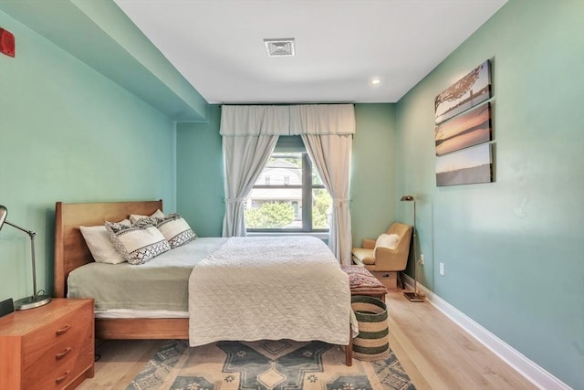 1 Brook Rd Unit 215, Quincy, MA 02169 - bedroom featuring light wood-style flooring, baseboards, and recessed lighting