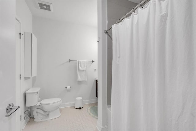 1 Brook Rd Unit 215, Quincy, MA 02169 - bathroom featuring toilet, tile patterned floors, and shower / bath combination with curtain