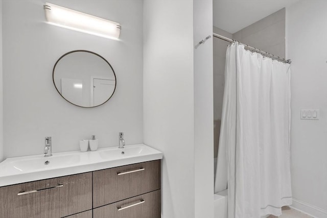 1 Brook Rd Unit 215, Quincy, MA 02169 - bathroom with double vanity and shower / bathtub combination with curtain