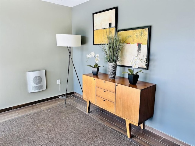 1 Brook Rd Unit 215, Quincy, MA 02169 - home office with wood tiled floors, baseboards, and heating unit