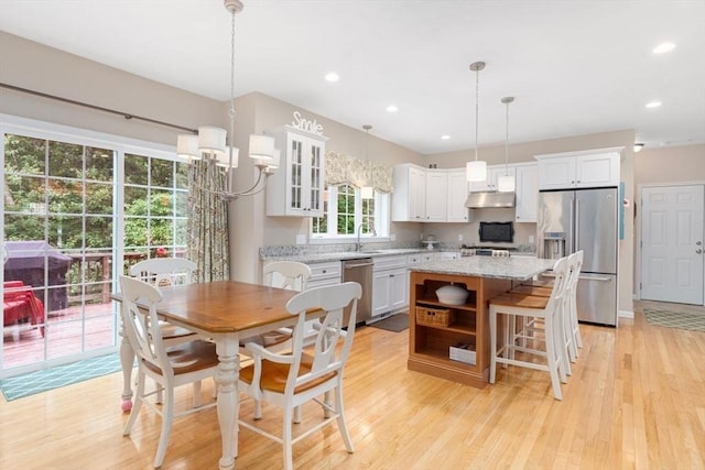 12 Cranberry Ln, Wrentham, MA 02093 - dining area featuring light wood finished floors, recessed lighting, and a chandelier