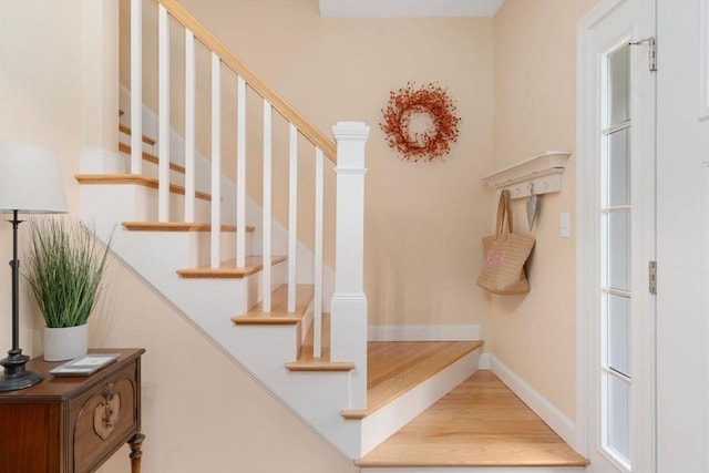 12 Cranberry Ln, Wrentham, MA 02093 - stairs with wood finished floors and baseboards