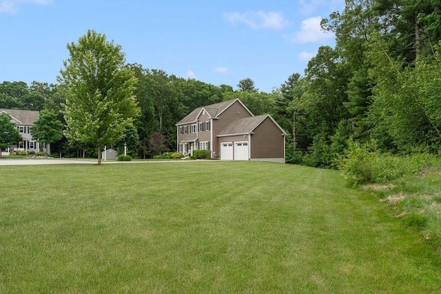 12 Cranberry Ln, Wrentham, MA 02093 - view of grassy yard with a garage