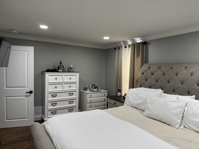 bedroom with ornamental molding, dark wood-style flooring, and recessed lighting