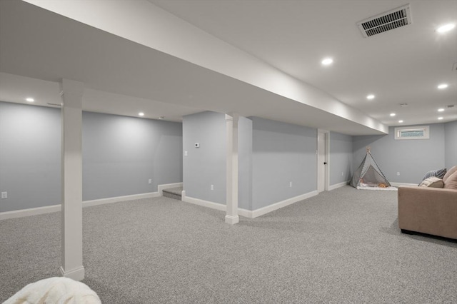 finished below grade area with carpet, recessed lighting, and baseboards