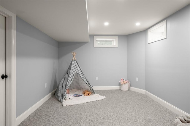 recreation room featuring carpet flooring, recessed lighting, and baseboards