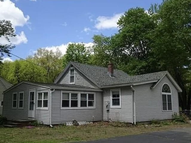 95 Prospect Street Ext, Westfield, MA 01085 - view of side of home with a chimney