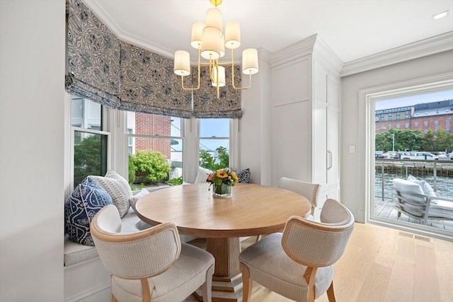 8 Union Wharf Unit 8, Boston, MA 02109 - dining area with a chandelier, wood finished floors, and ornamental molding