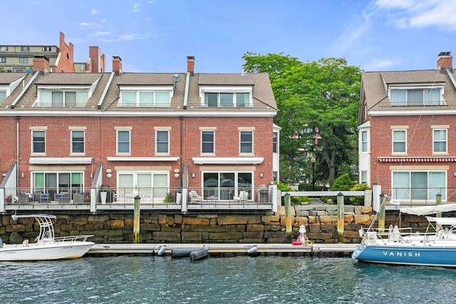 8 Union Wharf Unit 8, Boston, MA 02109 - back of house featuring brick siding and a water view