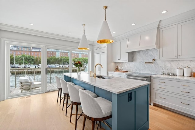 8 Union Wharf Unit 8, Boston, MA 02109 - kitchen with a sink, healthy amount of natural light, tasteful backsplash, ornamental molding, and recessed lighting