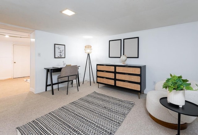 sitting room with light colored carpet