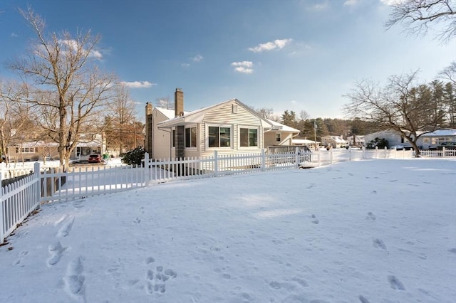 view of snow covered property