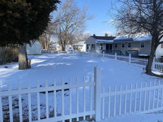 view of yard covered in snow