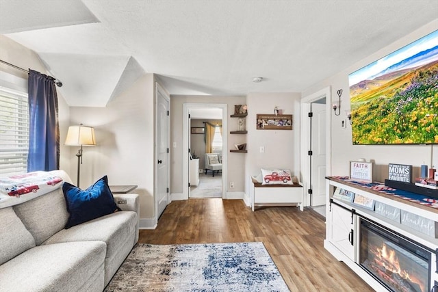 53 Avon St, Taunton, MA 02780 - living area featuring light wood-type flooring and baseboards