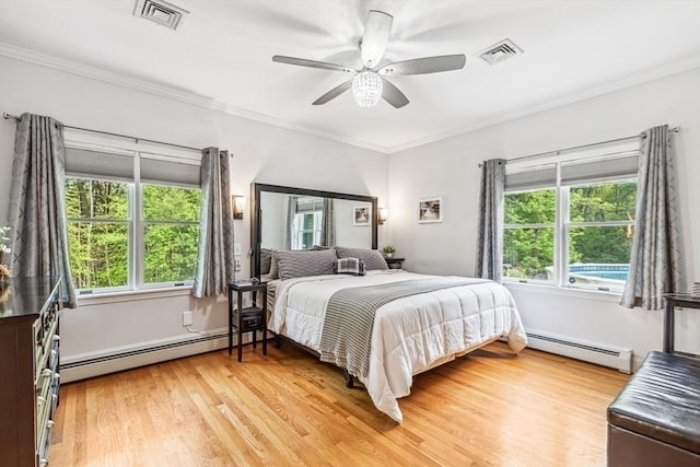 225 Walker St, Seekonk, MA 02771 - bedroom with a baseboard radiator, multiple windows, light wood-style floors, and ornamental molding