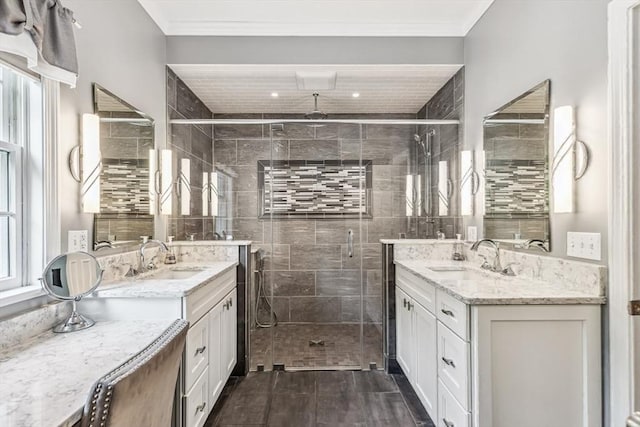 225 Walker St, Seekonk, MA 02771 - bathroom featuring a stall shower, two vanities, and wood finished floors