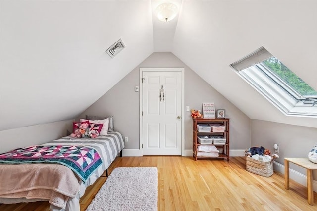 225 Walker St, Seekonk, MA 02771 - bedroom featuring vaulted ceiling, wood finished floors, a skylight, and baseboards