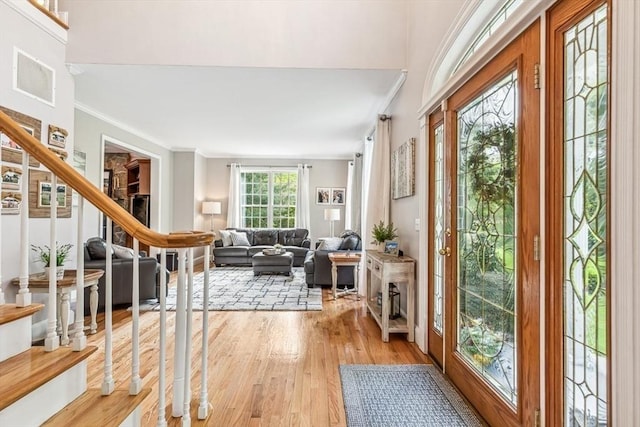 225 Walker St, Seekonk, MA 02771 - entryway featuring light wood-type flooring and crown molding