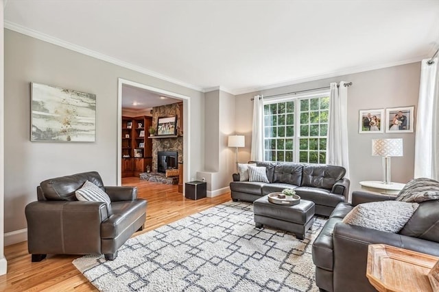 225 Walker St, Seekonk, MA 02771 - living area with ornamental molding, light wood-style flooring, and baseboards