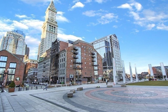 view of building exterior featuring a view of city