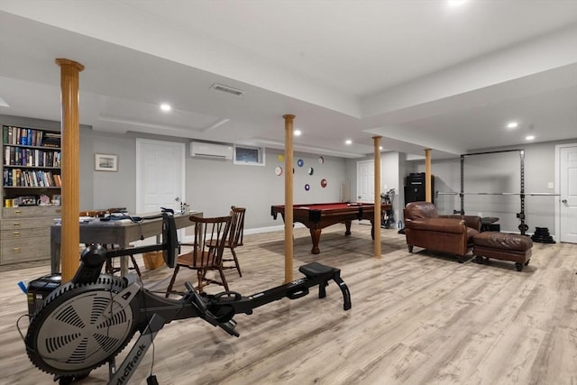 playroom with visible vents, light wood-type flooring, a wall unit AC, recessed lighting, and billiards